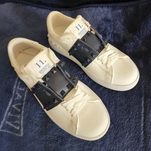 White Valentino Sneakers with blue stud details. Size 10 US 40 EUROPEAN.
